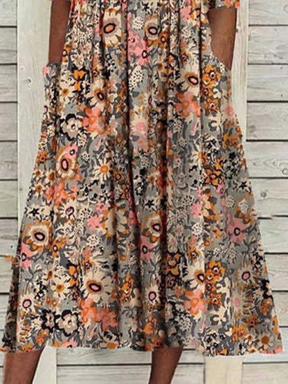 Delia - Robe midi d'été à manches courtes avec imprimé floral